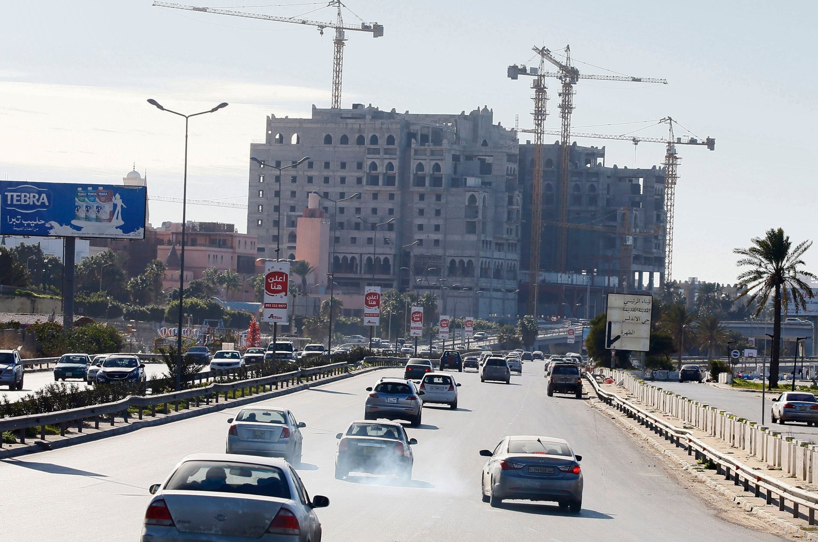 Libyans commute on a highway in the capital Tripoli, Libya, Feb. 3, 2020. (AFP Photo)