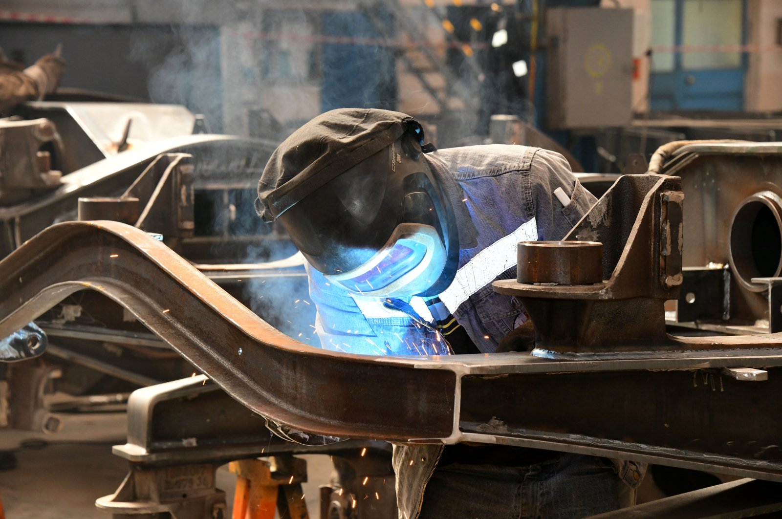An employee seen working in the Turkish Railway Machines Industry Inc. (TÜDEMSAŞ) factory in central Sivas province, Turkey, Oct. 3, 2019. (AA Photo)
