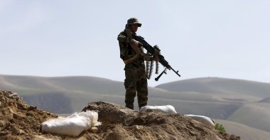 An Afghan National Army (ANA) soldier keeps watch during a patrol in Dand Ghori district of Baghlan province, Afghanistan on March 15, 2016. (Reuters Photo)