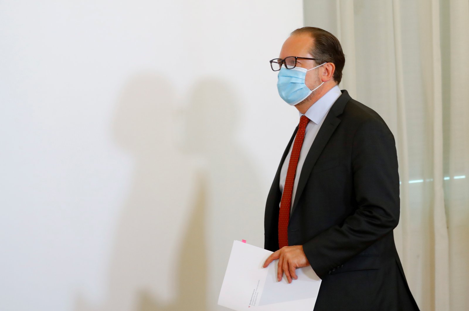 Austrian Foreign Minister Alexander Schallenberg, wearing a protective face mask, arrives for a news conference as the coronavirus disease outbreak continues in Vienna, Austria Sept. 16, 2020. (Reuters Photo)