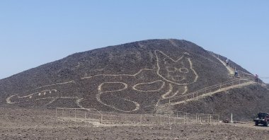 This handout photo provided by Peru's Ministry of Culture-Nasca-Palpa shows the figure of a feline on a hillside in Nazca, Peru, Friday, Oct. 9, 2020 (AP Photo)