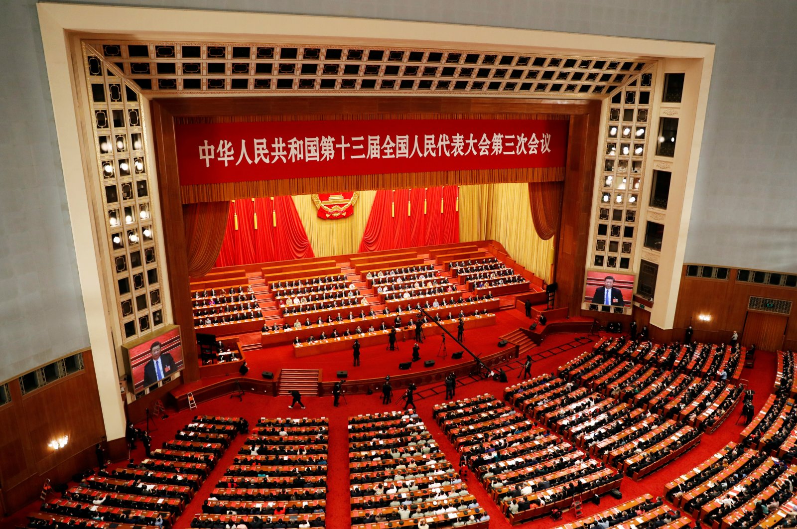 Chinese officials and delegates attend the closing session of the National People's Congress (NPC) at the Great Hall of the People in Beijing, China May 28, 2020. (Reuters Photo)