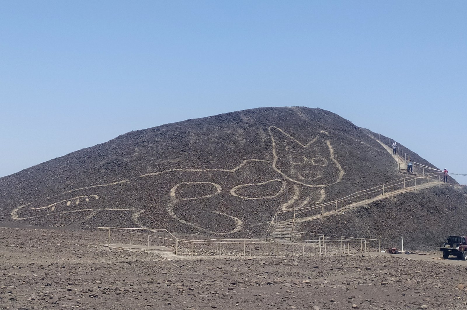 This handout photo provided by Peru's Ministry of Culture-Nasca-Palpa shows the figure of a feline on a hillside in Nazca, Peru, Friday, Oct. 9, 2020 (AP Photo)