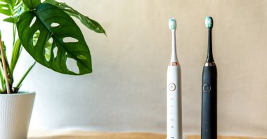 Smart toothbrushes are suited to people who are older or limited in mobility, but they're often best off in the hands of someone who enjoys using technology. (Shutterstock Photo)