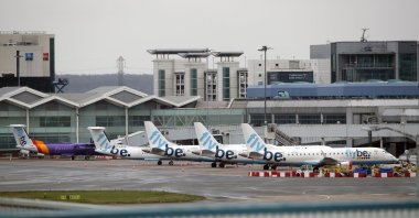 Grounded Flybe planes seen at Birmingham Airport, the U.K., March 19, 2002. (Reuters Photo)