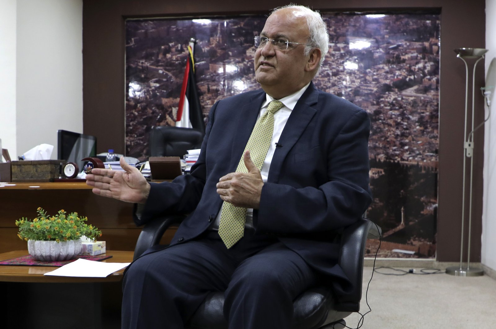 Saeb Erekat, Secretary-General of the Palestine Liberation Organisation and chief Palestinian negotiator, talking to reporters in the West Bank city of Ramallah, Palestine, March 3, 2020  (AFP Photo)