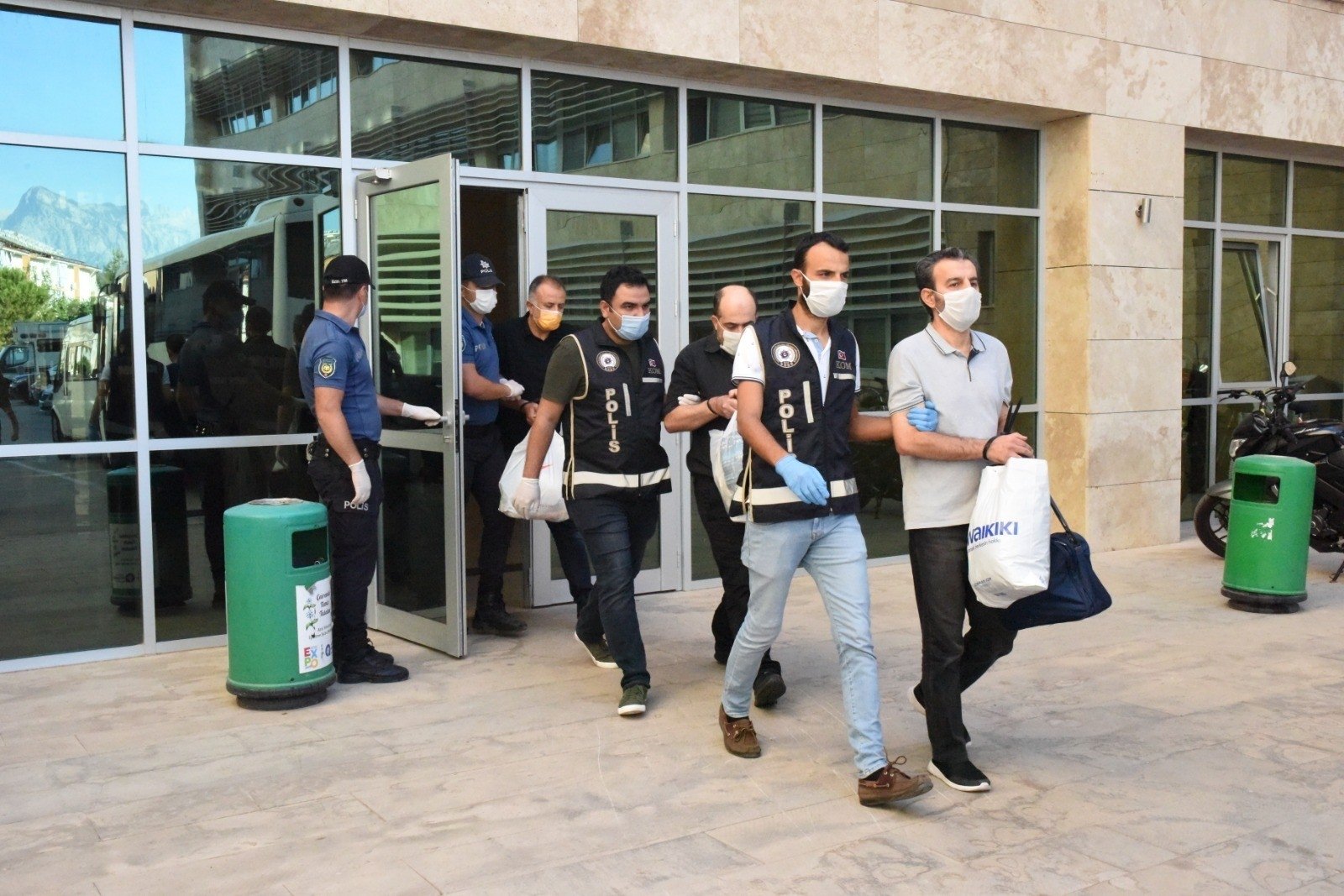 Police escort FETÖ suspects captured in an operation, in Antalya, southern Turkey, Oct. 17, 2020. (İHA Photo) 