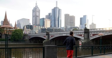 A man runs along a waterway after lockdown restrictions were implemented in response to an outbreak of COVID-19 in Melbourne, Australia, July 10, 2020. (Reuters Photo)