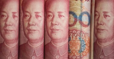 This photo illustration shows Chinese 100 yuan notes in Beijing, China, Jan. 6, 2017. (AFP Photo)