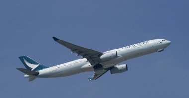 A Cathay Pacific Airways aircraft takes off at the Hong Kong International Airport, Hong Kong, Oct. 21, 2020. (AP Photo)