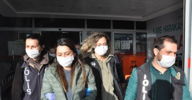 Police officers bring HDP officials to the hospital for routine health checkups in Kars province, Turkey, Oct. 7, 2020 (AA Photo)