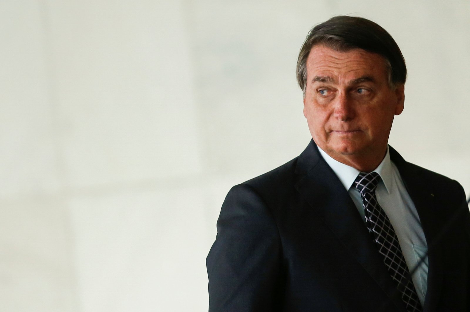 Brazil's President Jair Bolsonaro looks on before delivering a statement to the media with U.S. National Security Advisor Robert O'Brien (not pictured) at the Itamaraty Palace in Brasilia, Brazil, Oct. 20, 2020. (Reuters Photo)