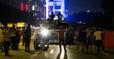 People take over a tank hijacked by putschists in Istanbul, Turkey, July 16, 2016. (AFP Photo)