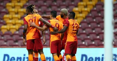 Galatasaray players celebrate in front of empty stands during a Süper Lig match against Alanyaspor, in Istanbul, Turkey, Oct. 19, 2020. (AA Photo)