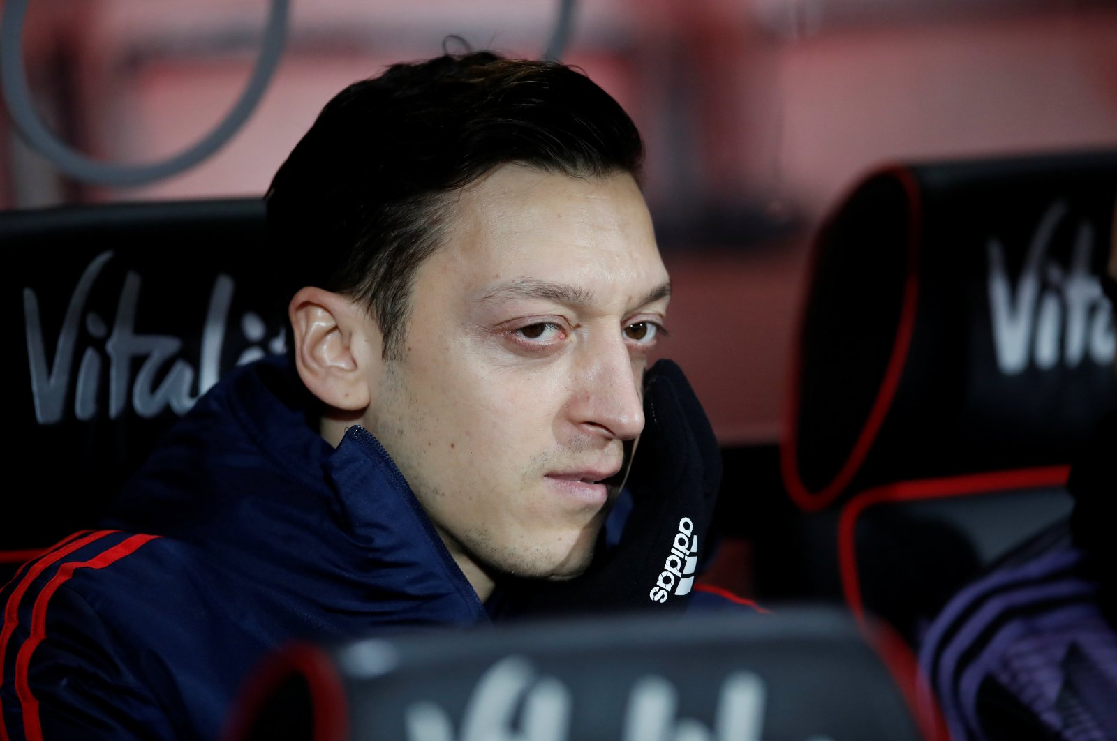 Arsenal midfielder Mesut Özil sits on the substitutes bench before the FA Cup Fourth Round football match between Bournemouth and Arsenal
at the Vitality Stadium in Bournemouth, England, Jan. 27, 2020. (Reuters Photo)