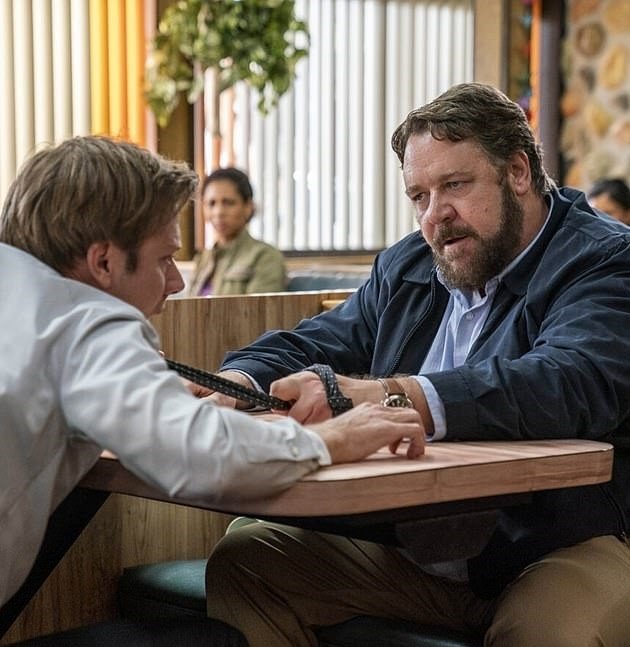 Actor Russell Crowe (R) in a still shot from “Unhinged.”