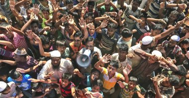 Rohingya refugees shout slogans against repatriation at Unchiprang camp near Cox's Bazar, Bangladesh, Nov. 15, 2018. (AP Photo)