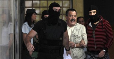 Lawmaker of extreme-right Golden Dawn party Christos Pappas (C) shouts as he leaves the Greek police headquarters in Athens on Sept. 29, 2013. (Reuters Photo)