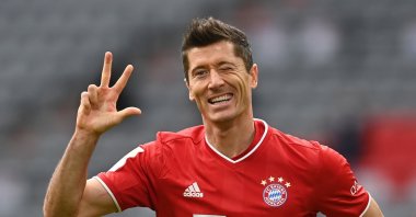 Bayern Munich's Polish forward Robert Lewandowski celebrates scoring his third for his hat-trick during the German first division Bundesliga football match against Eintracht Frankfurt on Oct. 24, 2020, in Munich, southern Germany. (AFP Photo)