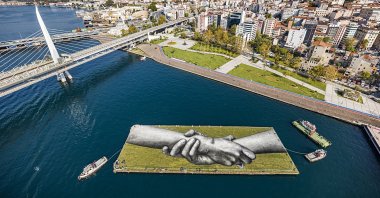 An aerial view from French artist Saype's land art on the Bosporus' Golden Horn in Istanbul on Oct. 26, 2020. (AA PHOTO)