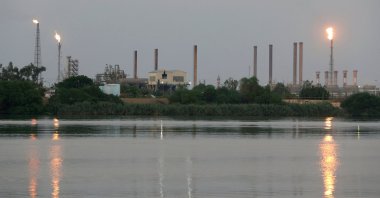 A general view of Abadan oil refinery in southwest Iran, is pictured from Iraqi side of Shatt al-Arab in Al-Faw south of Basra, Iraq September 21, 2019. (Reuters Photo)