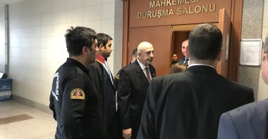 Nazmi Mete Cantürk (C) enters the courtroom for a hearing in Istanbul, Turkey, Oct. 2, 2019. (PHOTO BY FATİH ULAŞ) 
