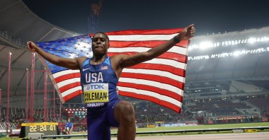 Christian Coleman, of the United States, celebrates winning the gold medal in the men's 100 meter final race at the World Athletics Championships in Doha, Qatar, Sept. 28, 2019. (AP Photo)