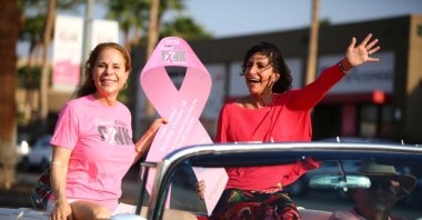 Palm Desert Council members participate in Friday Cruise Night for breast cancer awareness on El Paseo in Palm Desert, Calif., on October 9, 2020. (REUTERS Photo)