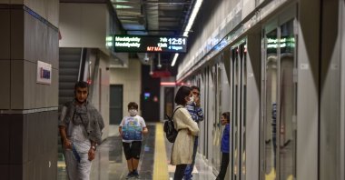 Passengers walk in a station of Mecidiyeköy-Mahmutbey metro line, Oct. 28, 2020. (DHA Photo)