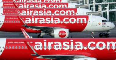 AirAsia planes are parked at Kuala Lumpur International Airport 2, in Sepang, Malaysia, Oct. 6, 2020. (Reuters Photo)