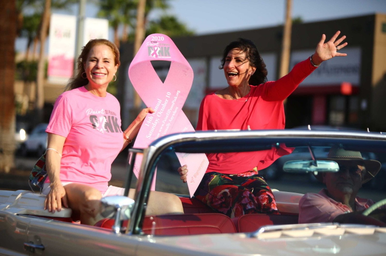 Palm Desert Council members participate in Friday Cruise Night for breast cancer awareness on El Paseo in Palm Desert, Calif., on October 9, 2020. (REUTERS Photo)