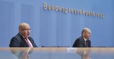 German Finance Minister Olaf Scholz (R) and German Economy Minister Peter Altmaier brief the media during a news conference about financial support for the German economy during the coronavirus crises in Berlin, Germany, Thursday, Oct. 29, 2020. (AP Photo)