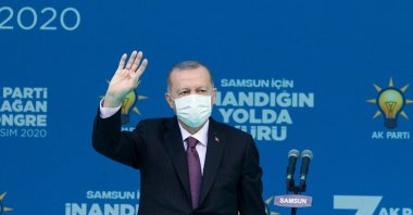 President Recep Tayyip Erdoğan salutes people during the AK Party's provincial congress meeting in Samsun province, Turkey, Nov. 1, 2020. (AA)