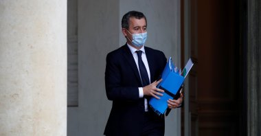 French Interior Minister Gerald Darmanin, wearing a protective mask, leaves following the weekly Cabinet meeting at the Elysee Palace in Paris, France, Oct. 28, 2020. (Reuters Photo)