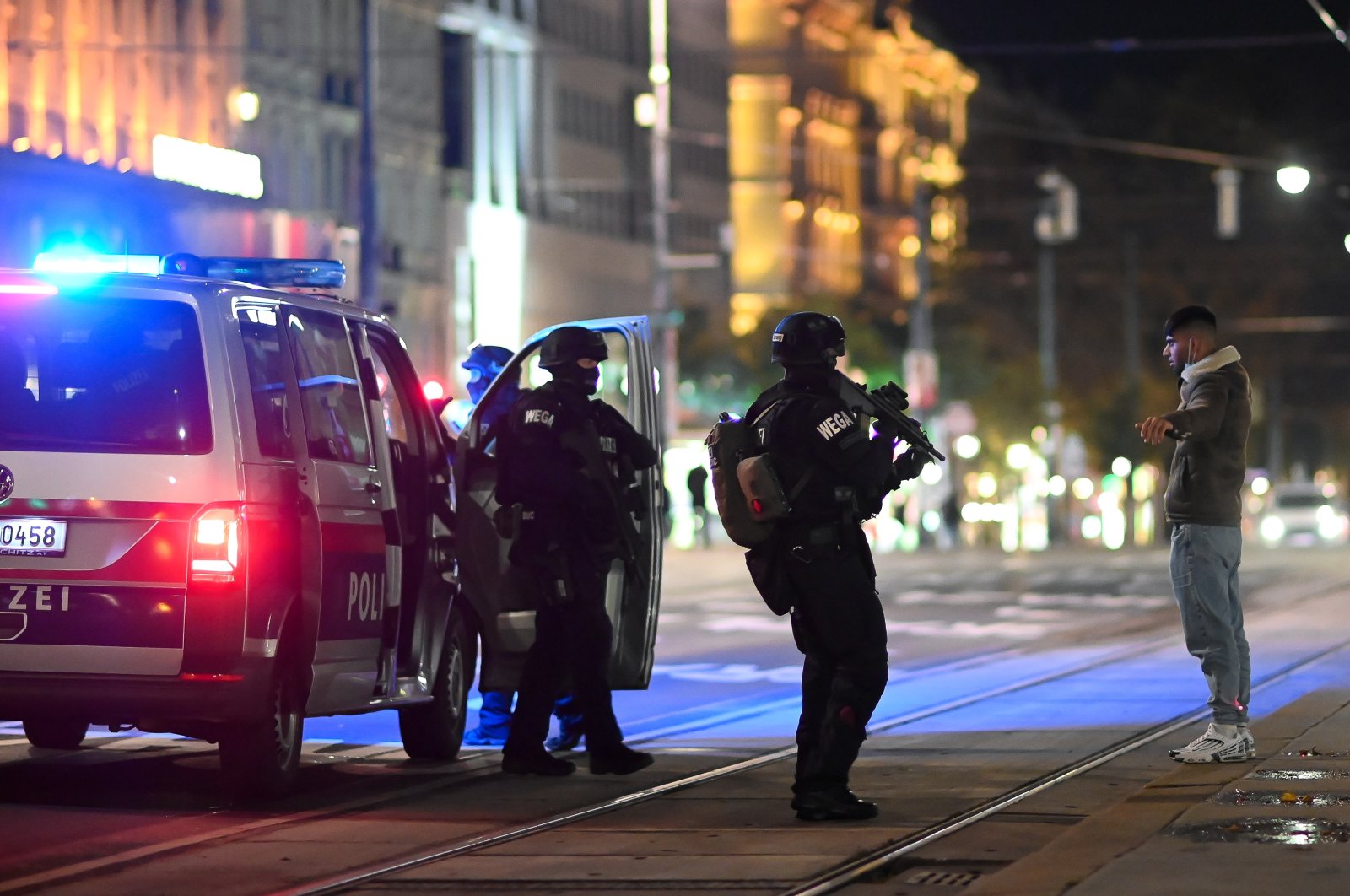 Austrian police special forces search a civilian infront of The Wiener Staatsoper (Vienna State Opera) after a shooting near the Stadttempel' synagogue in Vienna, Austria, 02 November 2020. (EPA Photo)