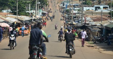 A general view of residents on a street in Daoukro, Ivory Coast on Nov. 3, 2020. (AFP Photo)