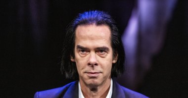Australian artist Nick Cave looks on during a press conference to promote his exhibition "Stranger Than Kindness" in Copenhagen, Denmark, Nov. 2, 2020. (AP Photo)