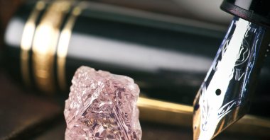 An undated handout photo released by mining giant Rio Tinto shows a 12.76 carat pink diamond – the largest of the rare and precious stones ever found in Australia on Feb. 22, 2012. (AFP Photo)