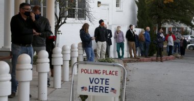 Voters wait in line before the polls open at All Souls Unitarian Church in Tulsa, Okla., U.S., Nov. 3, 2020. (AP Photo)