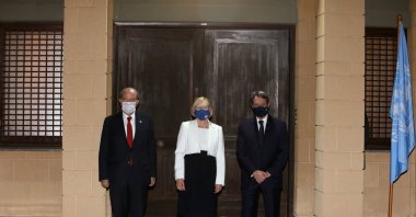 Elizabeth Spehar, the U.N. special representative of the secretary-general and head of UNFICYP mission, poses with Cypriot President Nicos Anastasiades and Turkish Cypriot President Ersin Tatar in the buffer zone of Nicosia airport, Cyprus, Nov. 3, 2020. (Reuters Photo)