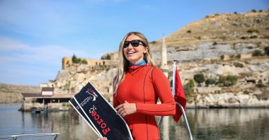 Şahika Ercümen dived into the waters of Halfeti in Şanlıurfa as part of her collaboration with the UNDP on solid waste management on Nov. 4, 2020. (AA Photo)