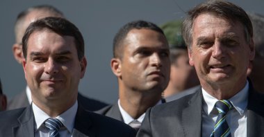 Brazilian President Jair Bolsonaro (R) and his son Flavio Bolsonaro attend a ceremony marking the 130th anniversary of the Rio de Janeiro Military School (CMRJ), in Rio de Janeiro, Brazil, May 6, 2019. (AFP Photo)