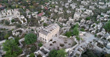 Historical houses and a church (C) are seen in Kayaköy village, Muğla, southwestern Turkey, Nov. 4, 2020. (AA PHOTO)