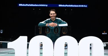 Rafael Nadal poses with the trophy for his 1,000th victory after the Paris Masters match against Feliciano Lopez, in Paris, France, Nov. 4, 2020. (AFP Photo)