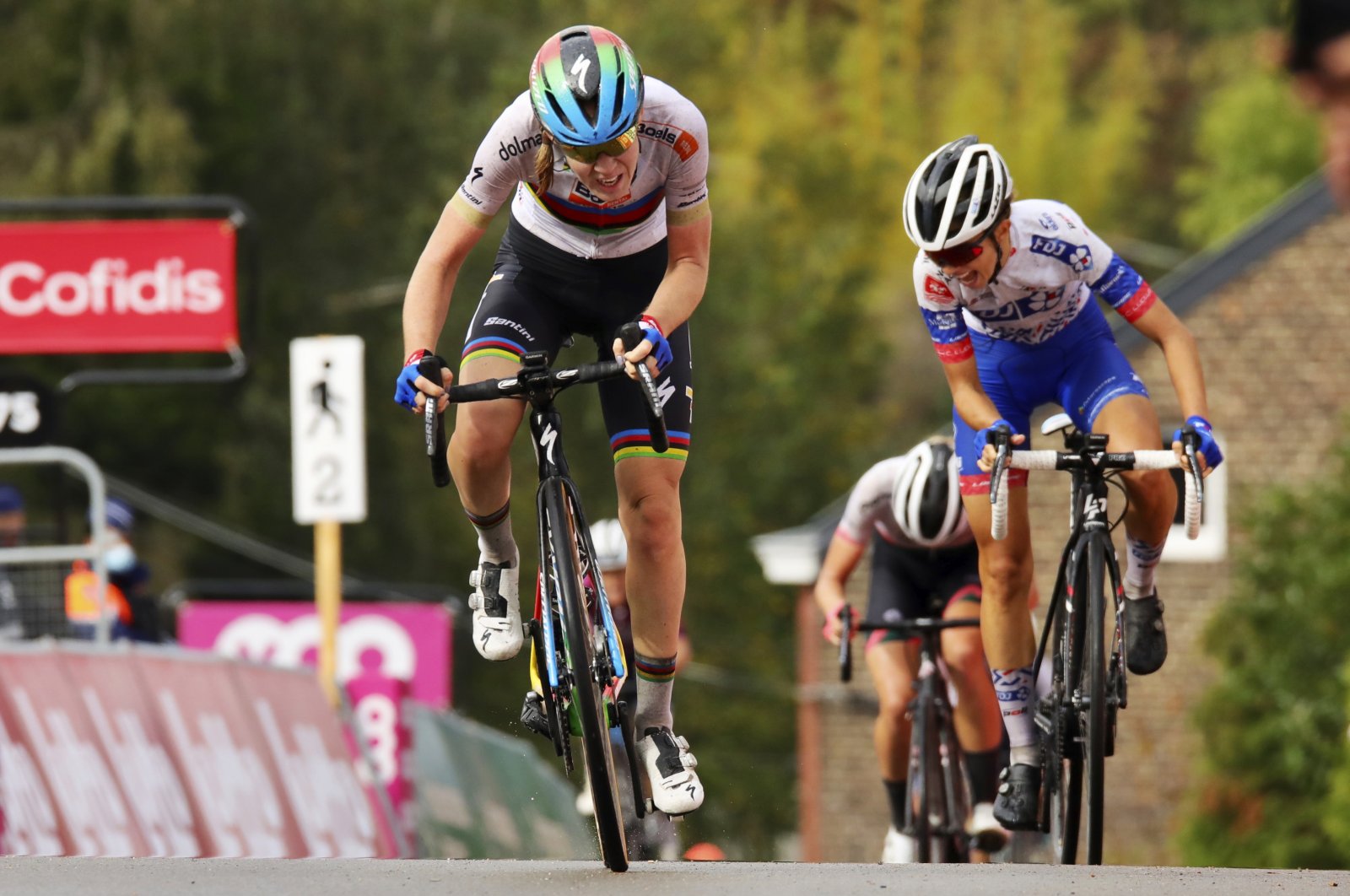 Anna Van Der Breggen (L) in action during the women's UCI World Tour race Fleche Wallonne, in Huy, Belgium, Sept. 30, 2020. (AP Photo)