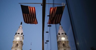 The American flag hangs from a building near Philadelphia City Hall, in Pennsylvania, U.S., Nov. 4, 2020. (AFP Photo)