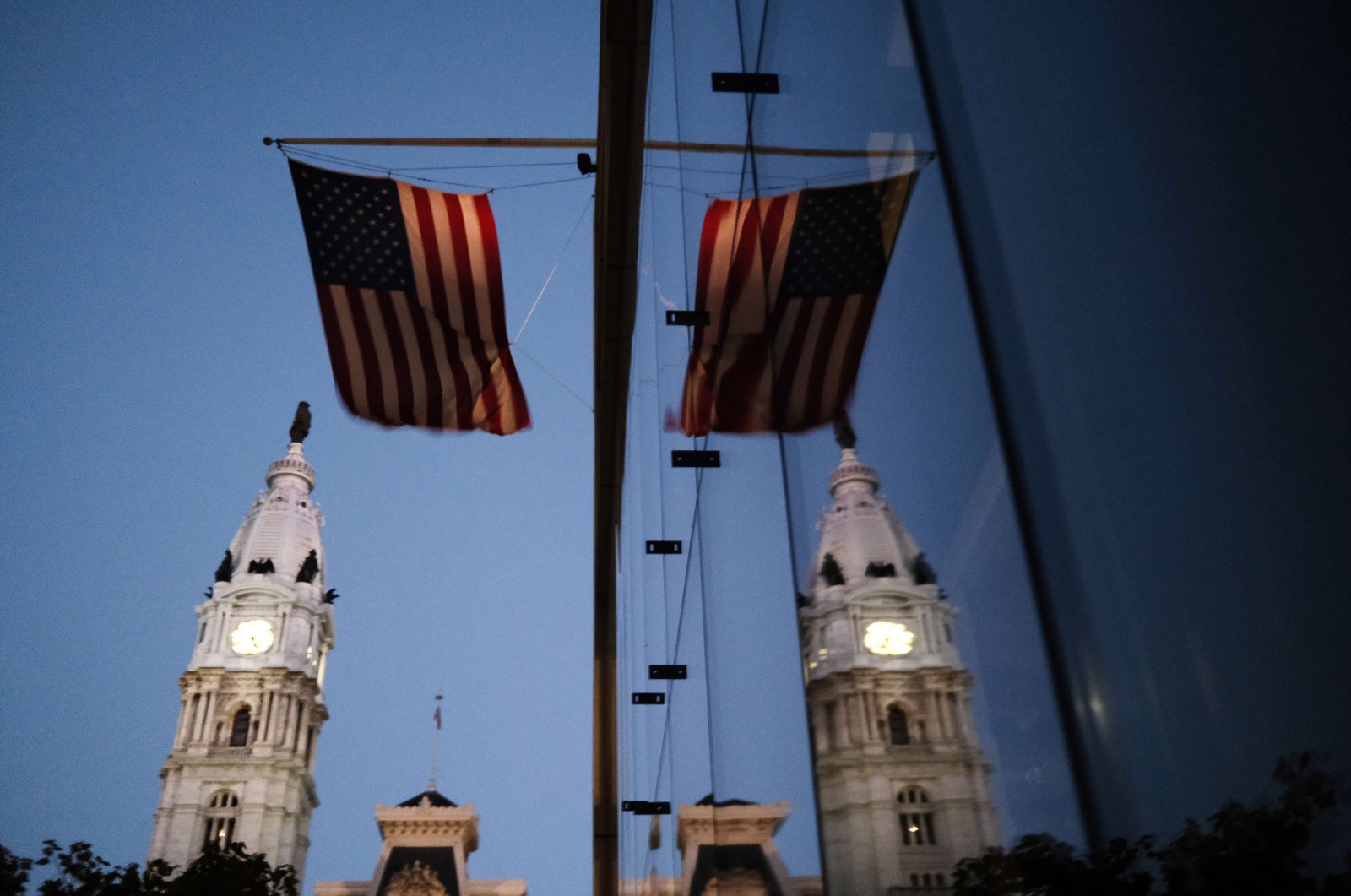 The American flag hangs from a building near Philadelphia City Hall, in Pennsylvania, U.S., Nov. 4, 2020. (AFP Photo)