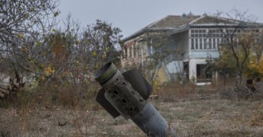 An unexploded Armenian missile in front of a house in Tartar, Azerbaijan, Nov. 5, 2020 (AA Photo)