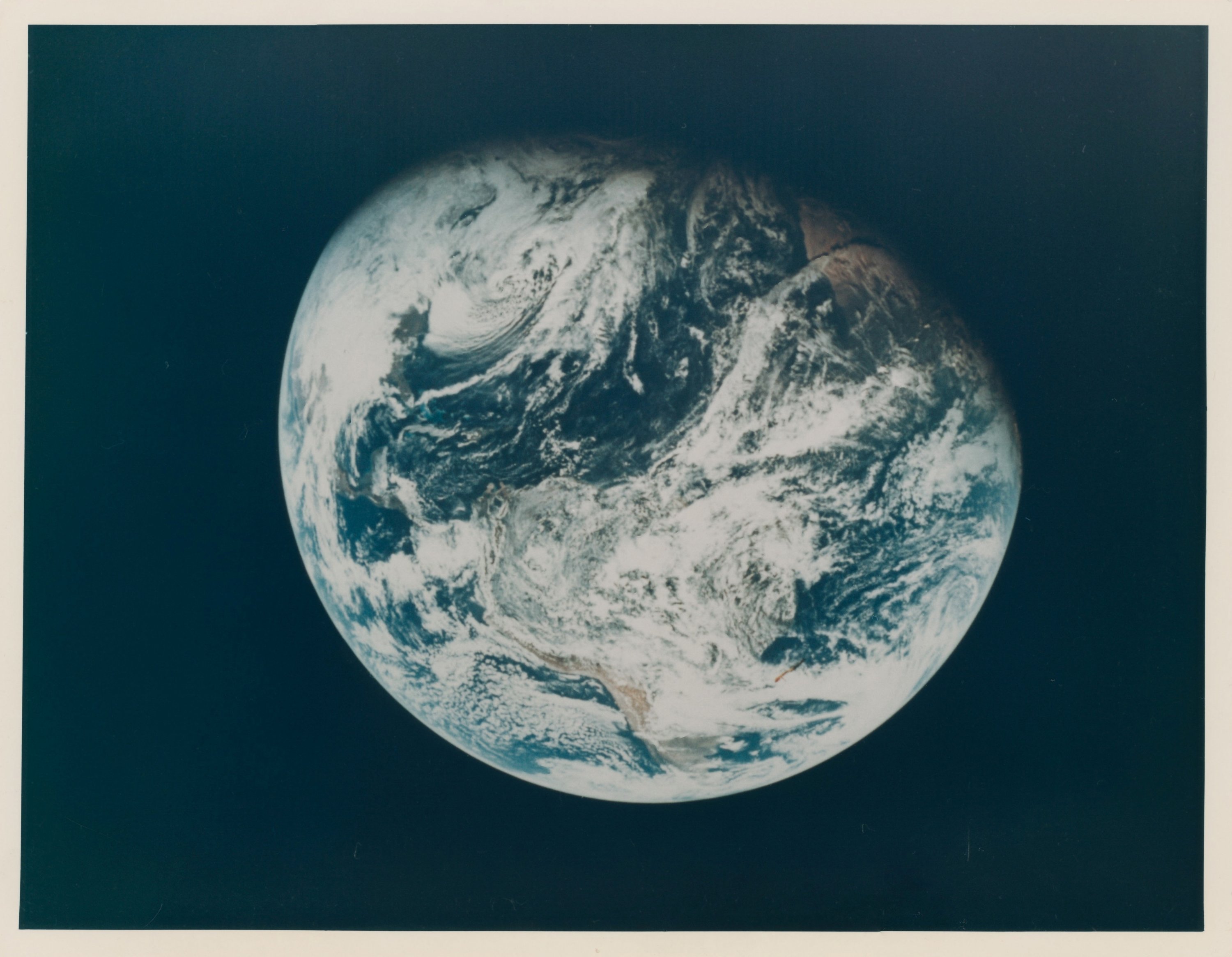 A handout image of Lot 210, First human-taken photograph of the Planet Earth by Apollo 8 crewmember William Anders from December 1968, one of the space photographs in a collection up for auction at Christie