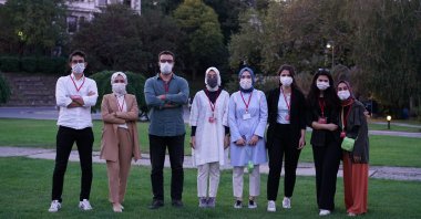 Justice and Development Party (AK Party) Istanbul Deputy Rümeysa Kadak (fourth from the left) poses with Policy Analysis Group (PAG) teammates in front of Boğaziçi University in Istanbul, Turkey in October 2020. (Handout Photo)